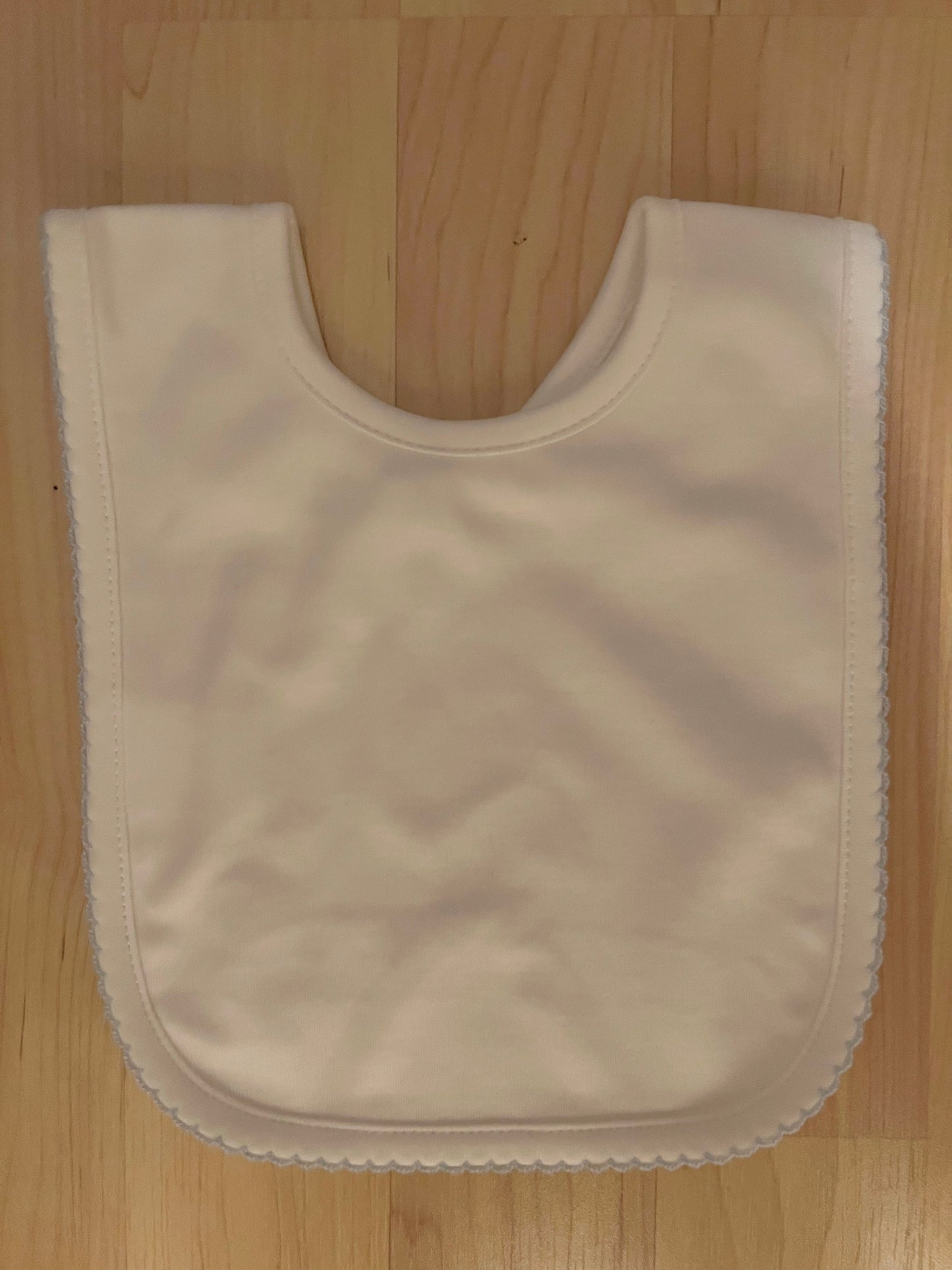 White with blue trim pima cotton bib