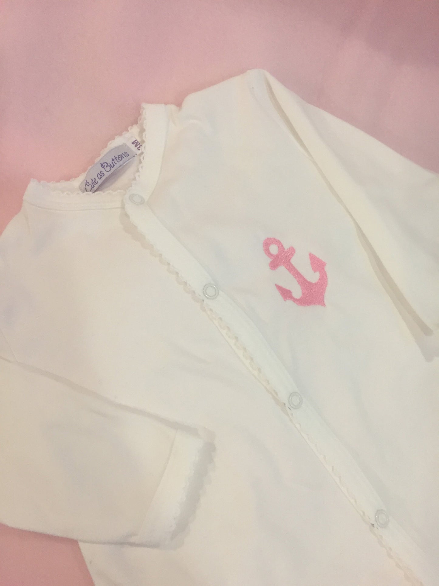 White footie with Anchor