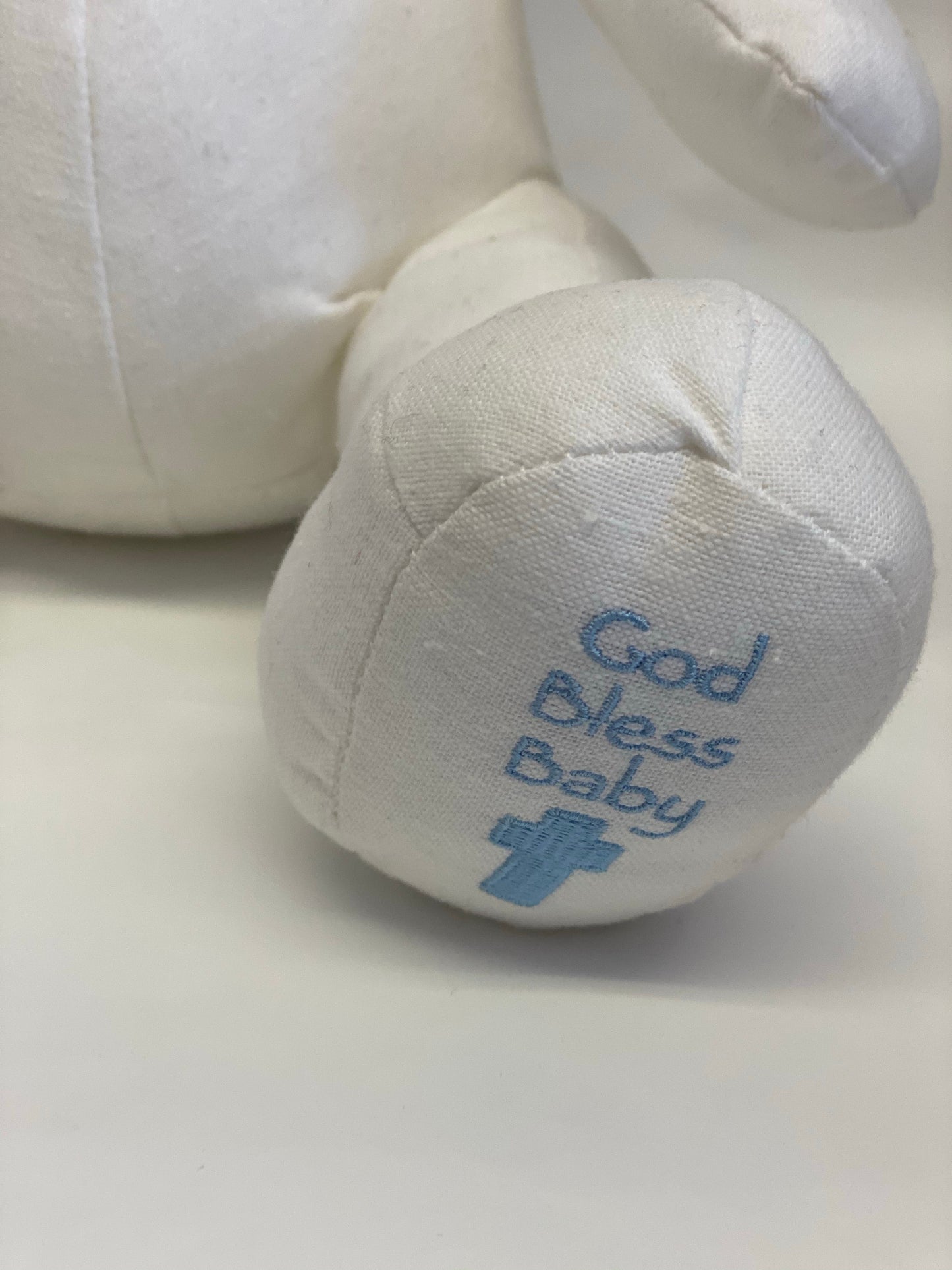 White Teddy Bear God Bless Baby in blue