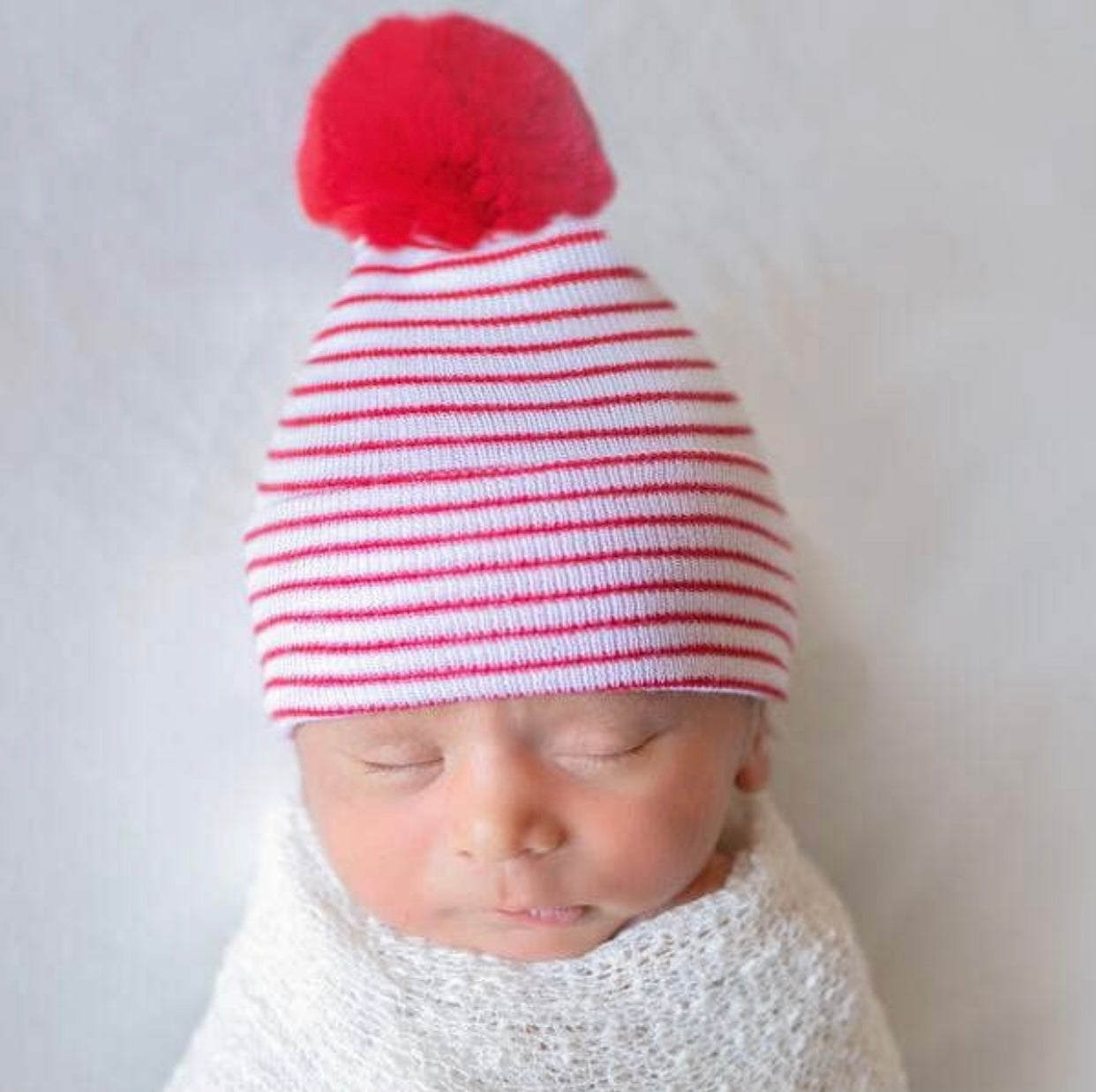 Red and White Striped Beanie with Red Fuzzy Pom Pom Newborn Hospital Hat
