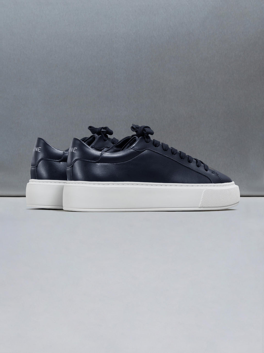 Essential Leather Trainer in Navy